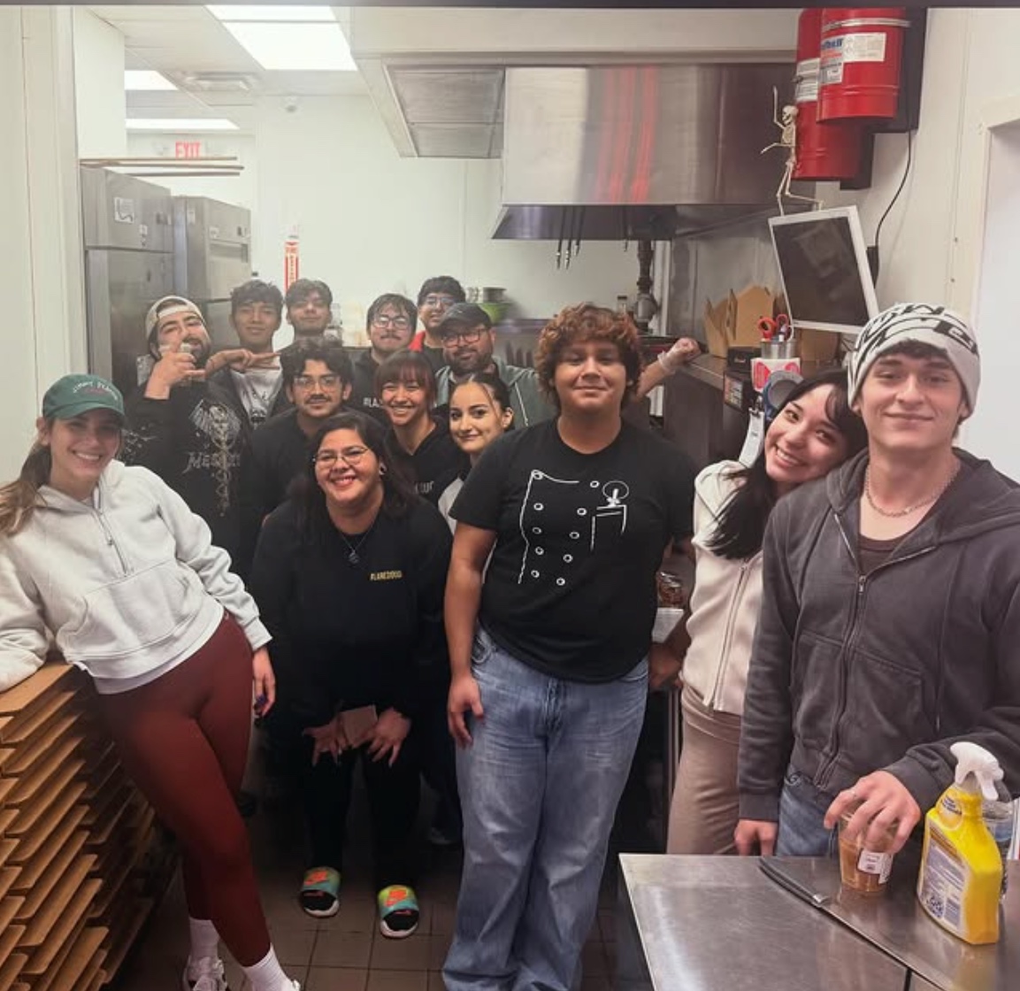 The 550 team behind the counter