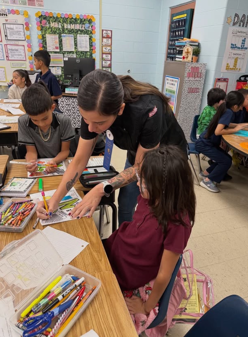 550 giving back at a local school event